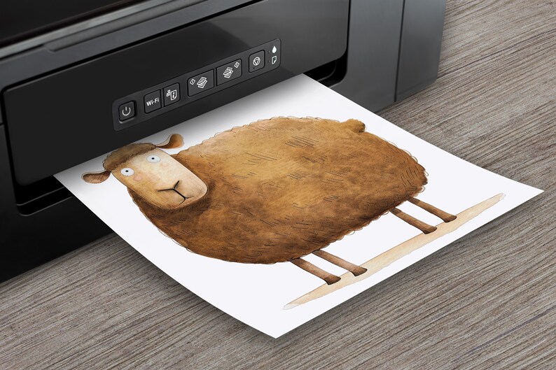 May include: A brown sheep with a white background is being printed from a black printer.