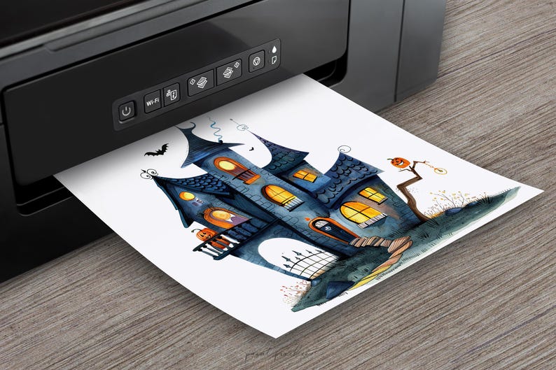 May include: A printable design featuring a watercolor illustration of a spooky blue and gray haunted house with orange pumpkins and a jack-o-lantern. The house has glowing windows and a black door. The design is printed from a black printer.