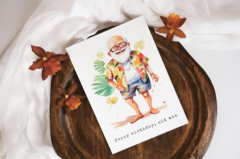 May include: A watercolor illustration of a man with a white beard and glasses wearing a colorful Hawaiian shirt and blue shorts. The illustration is on a white card with the text "Happy birthday, old man".