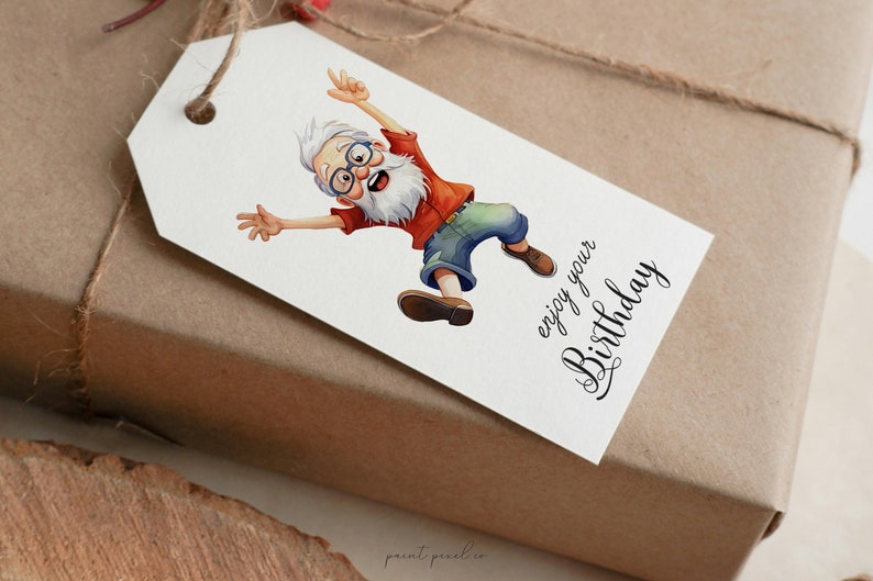 May include: A white gift tag with a cartoon illustration of a man with a white beard and glasses jumping in the air. The text "enjoy your Birthday" is written in black cursive.
