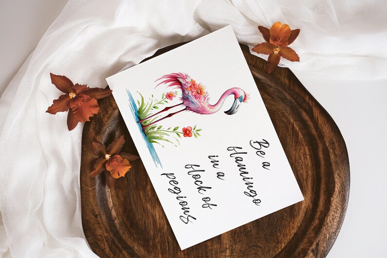 May include: A pink flamingo with flowers on its head stands in a pool of water. The text "Be a flamingo in a flock of peguins" is written below the flamingo.