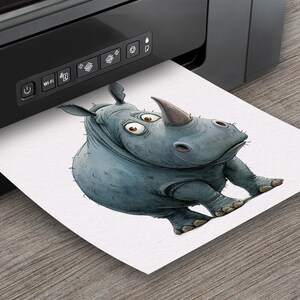 May include: A cartoon illustration of a gray rhinoceros with large eyes and a surprised expression. The rhino is printed on a white sheet of paper coming out of a black printer.