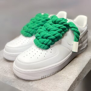 Chunky Laces Green 14mm thick shoelaces 140cm length , made from macrame twisted cotton rope, threaded in Air Force 1s. These premium laces transform classic sneakers with a unique style, merging personal flair with robust aesthetics.