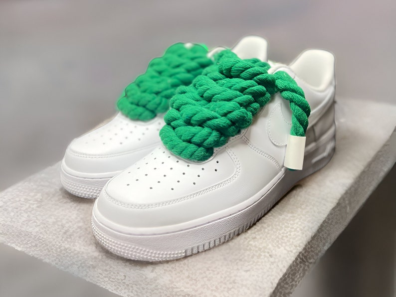 Chunky Laces Green 14mm thick shoelaces 140cm length , made from macrame twisted cotton rope, threaded in Air Force 1s. These premium laces transform classic sneakers with a unique style, merging personal flair with robust aesthetics.