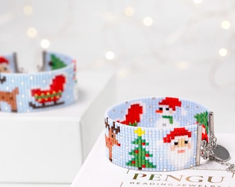 May include: A blue beaded bracelet with a Christmas theme. The bracelet features a reindeer, a snowman, a Christmas tree, and Santa Claus. The bracelet is made by Pengu Beading Jewelry.