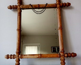 Miroir style bambou clair.