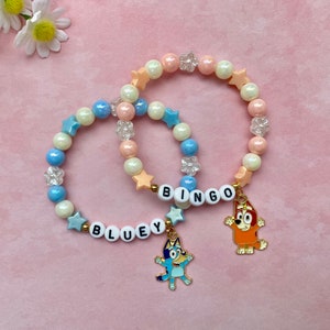 Pastel Coloured Personalised Bluey Inspired Bracelets. Novelty Cartoon Dog Bracelets. Bluey and Bingo Jewellery Gifts. Bluey Name Bracelets.