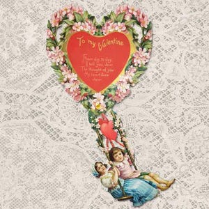 May include: Vintage Valentine's Day card featuring a heart-shaped wreath of pink flowers with a red heart in the center. The heart has a message that reads "To my Valentine From day to day I tell you, dear The thought of you My heart does sheen". Two children are swinging on a swing below the heart.