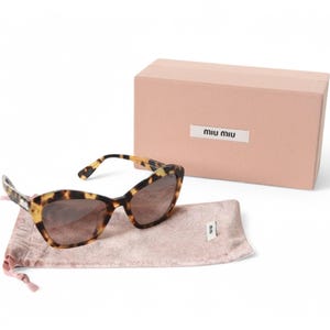 MIU MIU ブラウン キャットアイ メガネ（MU09WS サングラス べっ