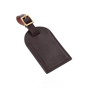 Etichetta per bagagli Louis Vuitton in pelle bordeaux in vendita su 1stDibs