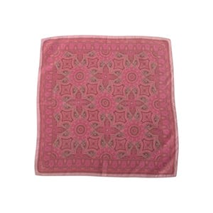 May include: A square, pink scarf with a detailed, repeating floral pattern. The scarf has a border and is made of a soft, possibly silk, material. The design features shades of pink and brown.