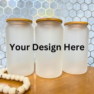May include: Three frosted glass jars with bamboo lids. The jars are empty and have the text "Your Design Here" printed on the front.