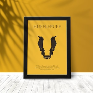 May include: A black framed print with a yellow background featuring a black badger illustration and the text "HUFFLEPUFF" in black. The text below the badger reads "Where they are just and loyal, Those patient Hufflepuffs are true, And unafraid of toil."