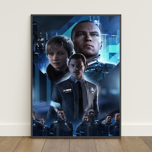 Könnte beinhalten: Ein gerahmtes Poster mit drei Charakteren aus dem Videospiel Detroit: Become Human. Das Poster hat ein blaues und schwarzes Farbschema mit den Charakteren im Vordergrund. Das Poster wird auf einem Holzboden ausgestellt.