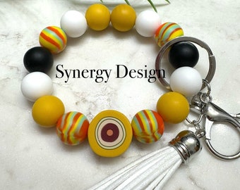 Wristlet keychains- Evil Eye Yellow, white, black striped design