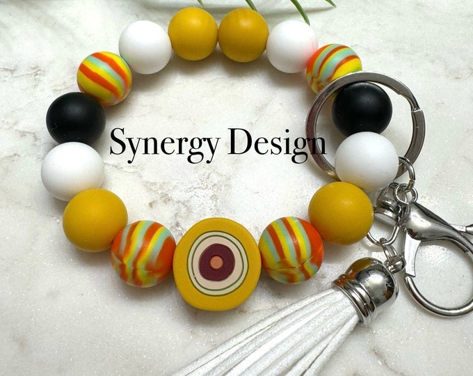 Wristlet keychains- Evil Eye Yellow, white, black striped design