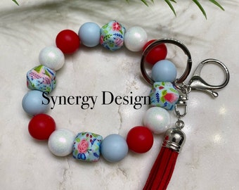 Wristlet keychains- Red, light blue, white shimmer and blue floral design