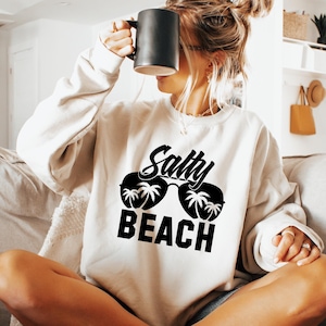 Salty Beach Sweatshirt, Trendy Beach T Shirt, Beach Trip Shirt, Aesthetic Surfing Hoodie For Woman, Vacay Tee, Travel Mode Gift, DKG6148