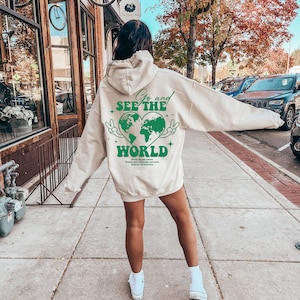 Gehen und sehen Sie die Welt Hoodie, ästhetische Wörter auf Rückseite Sweatshirt für Frauen, Reise-Liebhaber T-Shirt, Weltreise Shirt, trendiges Reisegeschenk, D8593