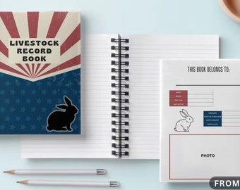 May include: A red, white, and blue spiral bound notebook with the text "Livestock Record Book" and a silhouette of a rabbit on the cover. The notebook has lined pages and a section for a photo and information about the animal. The text "This book belongs to:" is printed on the page.