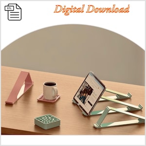 May include: A collection of pastel-colored tablet and phone stands, a mug of coffee, and a small square container are arranged on a wooden surface. The words "Digital Download" are displayed in orange text.