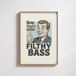 May include: Framed print with a vintage illustration of a man giving a thumbs up. The text reads "Now that's some FILTHY BASS" in bold, black letters. The artwork has a retro comic book style.