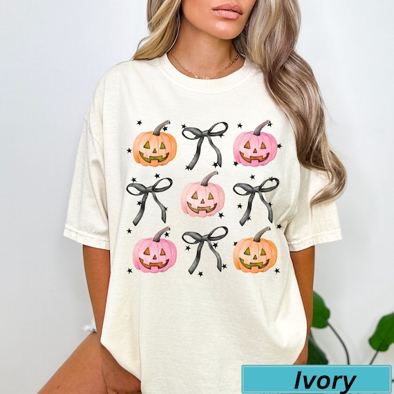Pink Halloween Tshirt, Spooky season Tshirt ,Pink pumpkin with bows Tshirt, Coquette Halloween Tshirt, Witchy Halloween Tshirt, Skeleton Tee