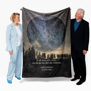 May include: A black fleece blanket with a star map design and the text "To The Stars Who Listen... And The Dreams That Are Answered" with the location "Salina Kansas" and the date "23 April 2020".