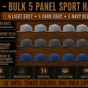 May include: A bulk lot of 18 five-panel sport hats featuring laser-cut ventilation. The set includes 6 light grey, 6 dark gray, and 6 navy blue hats. The text reads 18 - BULK 5 PANEL SPORT HATS, 6 LIGHT GREY, 6 DARK GRAY, 6 NAVY BLUE.