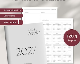May include: A5 2027 monthly planner with a white cover featuring the text Let's write 2027 MONATSPLANER Monatsübersichten Ziele Affirmation. The interior pages show a yearly calendar overview and quarterly goal sections. A red circle indicates 120 g paper.