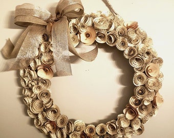 Handmade 16 inch wreath made with bookpage rolled flowers with wooden bloom accents.  Perfect accent for Farmhouse decor!  Custom colors!
