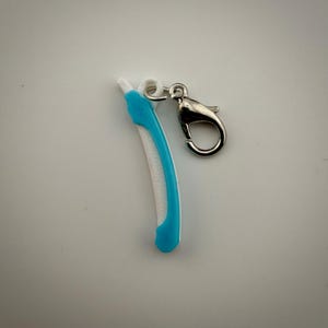 Divertidos adornos para insignias de enfermera: Canoa y urinario Cooter para el campeón CAUTI Purewick