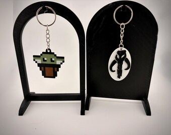 Breloczki z logo Mandalorian Star Wars – Grogu/Baby Yoda i Mythosaur