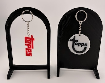 Breloczki z logo kart sportowych Topps