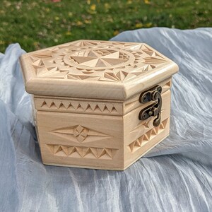 Handmade, hand carved wooden jewelry box with latch