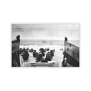May include: Black and white photograph of soldiers wading ashore from landing craft during the D-Day invasion of Normandy, France on June 6, 1944. The caption reads "D-Day, 06/06/44, Normandy, France."