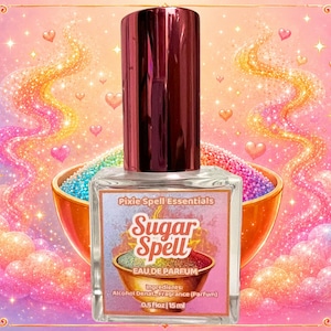 May include: A clear glass bottle of Sugar Spell eau de parfum with a dark metallic cap. The rectangular label features the text Pixie Spell Essentials, Sugar Spell, and lists ingredients with a volume of 0.5 fl oz or 15 ml on the front.