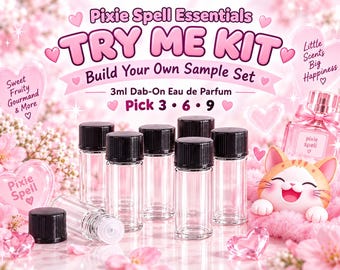 May include: A Pixie Spell Essentials Try Me Kit featuring six clear 3ml glass vials with black screw caps for a build your own sample set. The display includes text reading Pick 3, 6, 9, Sweet Fruity Gourmand & More, and Little Scents Big Happiness.