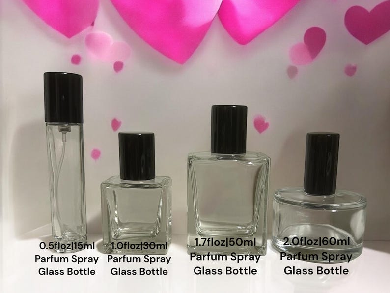 May include: Four glass perfume spray bottles with black caps. The bottles are clear and come in four sizes: 0.5 fl oz (15 ml), 1.0 fl oz (30 ml), 1.7 fl oz (50 ml), and 2.0 fl oz (60 ml).