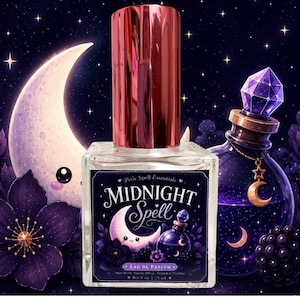 May include: A clear glass perfume bottle with a metallic pink cap and a rectangular label featuring the text Midnight Spell, a crescent moon, and a small potion bottle. The label also includes the text Pixie Spell Essentials and Eau de Parfum.