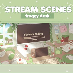 May include: A green froggy desk setup with a computer screen displaying "stream ending" and a progress bar. There is a Nintendo Switch, a headset, a cake, and other cute decorations on the desk.