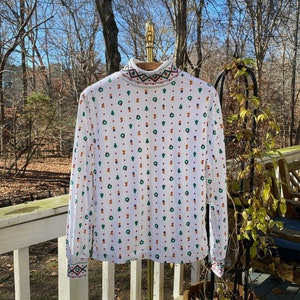 Christmas print turtleneck 2025