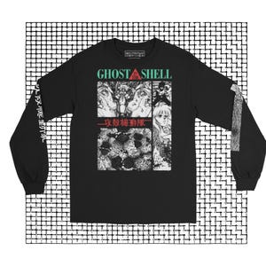May include: Black long-sleeve t-shirt with a graphic print of a manga scene from the anime "Ghost in the Shell". The text "Ghost in the Shell" is printed in green and white on the shirt. The manga scene is in black and white and features a group of characters. The text "攻殻機動隊" is printed in red on the shirt.