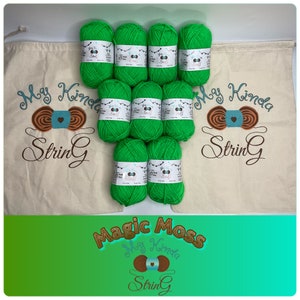 May include: Ten skeins of bright green yarn in a white drawstring bag with the text "My Kinda String" printed on it. The yarn is labeled "Magic Moss" and is arranged in two rows of five skeins.