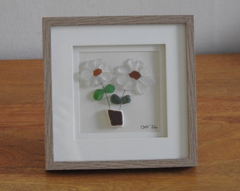 Framed picture with sea glass and pottery  - daisies in vase