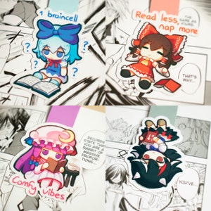 May include: Four colourful stickers featuring anime characters with text. The first sticker is blue and white with a character reading a book and the text "1 braincell". The second sticker is red and white with a character sleeping and the text "Read less, nap more". The third sticker is pink and white with a character reading a book and the text "Comfy vibes". The fourth sticker is black and white with a character upside down and the text "You've...".