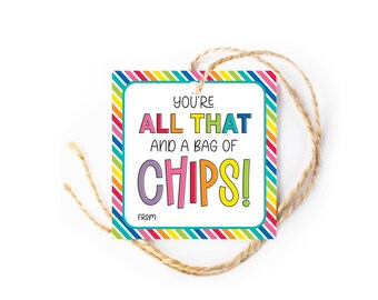 May include: A colorful gift tag with the text "You're all that and a bag of chips!" with rainbow stripes on the border. The tag is tied with twine.