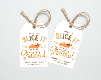 May include: Two white gift tags with brown twine. Each tag has the text "Any way you slice it, we are so grateful." A watercolor illustration of a slice of pie is in the center. The tags also include the text "Thanks for all you do! Love the Ashtons."