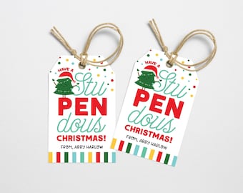 May include: Two white gift tags with red and green stripes. The tags feature a cartoon Christmas tree with a Santa hat and the text "Have a Stupendous Christmas!" with the sender's name below.