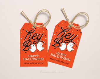 May include: Two orange Halloween gift tags with the text "Hey Boo" and two ghosts. The tags also say "Happy Halloween" and "From Miss Harlow".